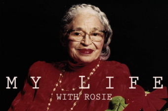 A lady wearing a read dress